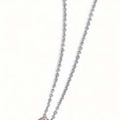 Pendentif en or gris, orné d'un diamant poire Fancy very light pink pesant 3,08 cts 