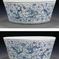 An unusual large blue and white 'dragon and phoenix' jardinière, 18th century