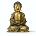 A gilt-bronze figure of a seated Shakyamuni Buddha, Ming dynasty, 16th century