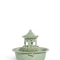 A rare Longquan celadon 'pavilion and boys' basin, Ming dynasty