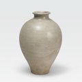 A straw glazed stoneware ovoid jar, Tang dynasty (618-907)