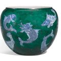 A blue and white and later green enamelled fish jar, Qing dynasty, Kangxi period (1622-1722)