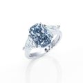 Fancy dark grey-blue diamond and diamond ring