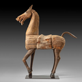 An important painted wood figure of a horse, China, Gansu province, Han dynasty (206 BC-220 AD)