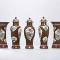 A set of five cafe-au-lait ground famille rose garniture, Qing dynasty, 18th century