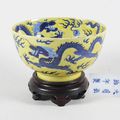A Chinese 'blue dragon' yellow ground bowl