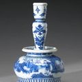 A blue and white porcelain candlestick. Transitional