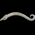 A calcified jade 'dragon' pendant, huang, Eastern Zhou dynasty, Warring States period (475-221 BC)