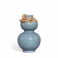 A robin's egg-glazed 'chilong' double-gourd vase Qing dynasty, 19th century