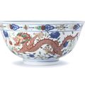 A fine wucai 'Dragon and Phoenix' bowl, Seal mark and period of Daoguang