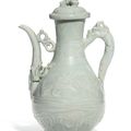 A rare Qingbai 'phoenix' ewer and cover, Yuan dynasty