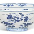 A fine and rare blue and white lobed ‘fruit and flower’ bowl, Mark and period of Xuande (1426-1435)