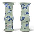 A pair of underglaze blue, copper-red, and celadon-glazed beaker vases, Qing dynasty, Kangxi period (1662-1722)