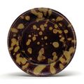 A Jizhou 'tortoiseshell'-glazed shallow dish, Southern Song-Yuan dynasty, 12th-14th century