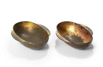 A pair of gilt-bronze ear cups, Han dynasty