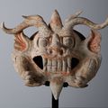 Terracotta guardian mask depicting a horned, leonine beast, Tang Dynasty (618–907)