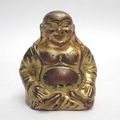 A lacquer gilt bronze figure of Budai. China or Vietnam, 18th-19th century