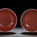 A fine pair of copper-red glazed saucer dishes, seal marks and period of Qianlong (1736-1795)