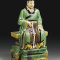 A large and imposing sancai stoneware figure of a Daoist deity, Ming dynasty
