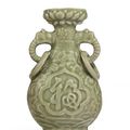 A molded Longquan celadon 'fu shou' vase, Yuan-early Ming dynasty, 14th century