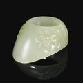 A carved jade archer's thumb ring, India, 17th century