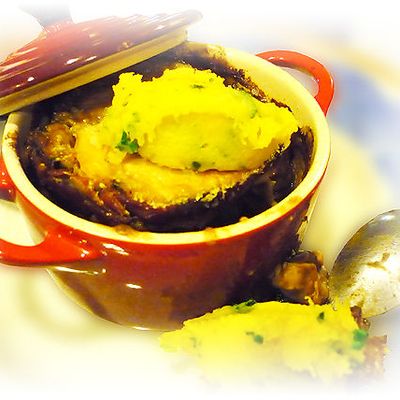 Mignon de porc en mini-cocotte, confis d'oignons et purée de courge Patidou au persil frais