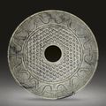A large pale grey jade disc, bi, Han dynasty, 2nd-1st century BC 