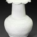 A white-glazed molded vase, 18th-19th century