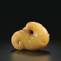 A fine yellow jade carving of a bird, 17th century