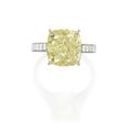 Platinum, 18 Karat Gold, Fancy Yellow Diamond And Diamond Ring, Graff