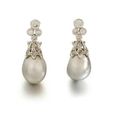 A pair of natural pearl and diamond earclips