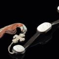 A fine silver-inalid hardwood scepter with fine carved white jade placques, China, 18th/19th century 