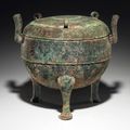 A large bronze ritual tripod food vessel and cover, ding, Spring and Autumn period, 6th century BC