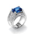 Harry Winston. Bridge platinum ring set with cushion-cut sapphire and diamonds. New York collection
