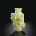 A carved yellow jade 'chilong' vase, Qing dynasty, 18th century