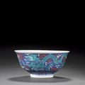 A blue-ground enamelled 'dragons' bowl, Qianlong seal mark and of the period