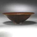 A persimmon-glazed 'Yaozhou' bowl, Song Dynasty  (960–1127)