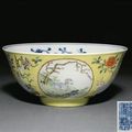 A yellow-ground famille rose 'medallion' bowl. Daoguang underglaze-blue six-character sealmark and of the period (1821-50)