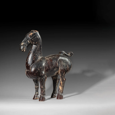 A black lacquered wood figure of a horse, China, Sichuan province, Han dynasty (206 BC-220 AD)