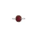 A 3.20 carats Mogok, Burma pigeon blood red' oval-cut ruby and diamond ring