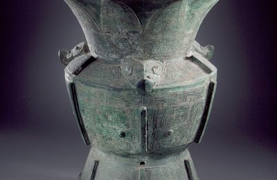 Ritual Wine Storage Jar (Zun) with Masks, Birds, and Bovine Heads, Late Shang dynasty, middle or late Anyang phase, about 1200-1050 B.C.