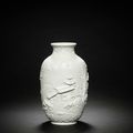 A rare biscuit porcelain relief-carved 'landscape' jar, Daoguang seal mark and of the period (1821-1850)