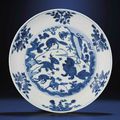 A fine and rare Ming blue and white 'Mythical beasts' dish , Wanli six-character mark within double-circles and of the period (1