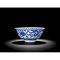 A blue and white 'dragon and phoenix' bowl. Mark and period of Wanli