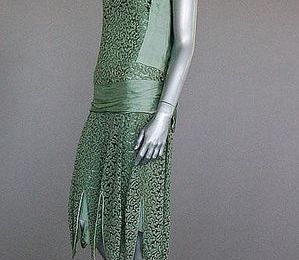 A Jeanne Paquin labelled green lace and satin flapper dress, Summer 1927