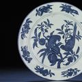 An important and extremely rare early Ming massive blue and white charger, Xuande six-character mark and of the period