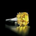 A superb 10.30 carats, Internally Flawless clarity fancy vivid orangy yellow octagonal step-cut diamond ring