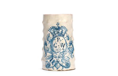 An exceptional London delftware 'bossed' tankard, dated 1653