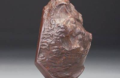 An inscribed limonite 'Guanyin' snuff bottle. Jiang Pu, dated 1760, probably a gift to the Qianlong emperor