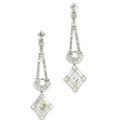 A pair of diamond pendent earrings